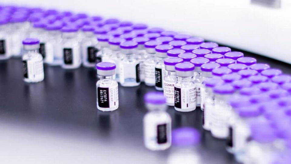 In this March 2021 photo provided by Pfizer, vials of the Pfizer-BioNTech COVID-19 vaccine are prepared for packaging at the company’s facility in Puurs, Belgium. Pfizer is about to seek U.S. authorization for a third dose of its COVID-19 vaccine, saying Thursday, July 8, 2021, that another shot within 12 months could dramatically boost immunity and maybe help ward off the latest worrisome coronavirus mutant. (Pfizer via AP)