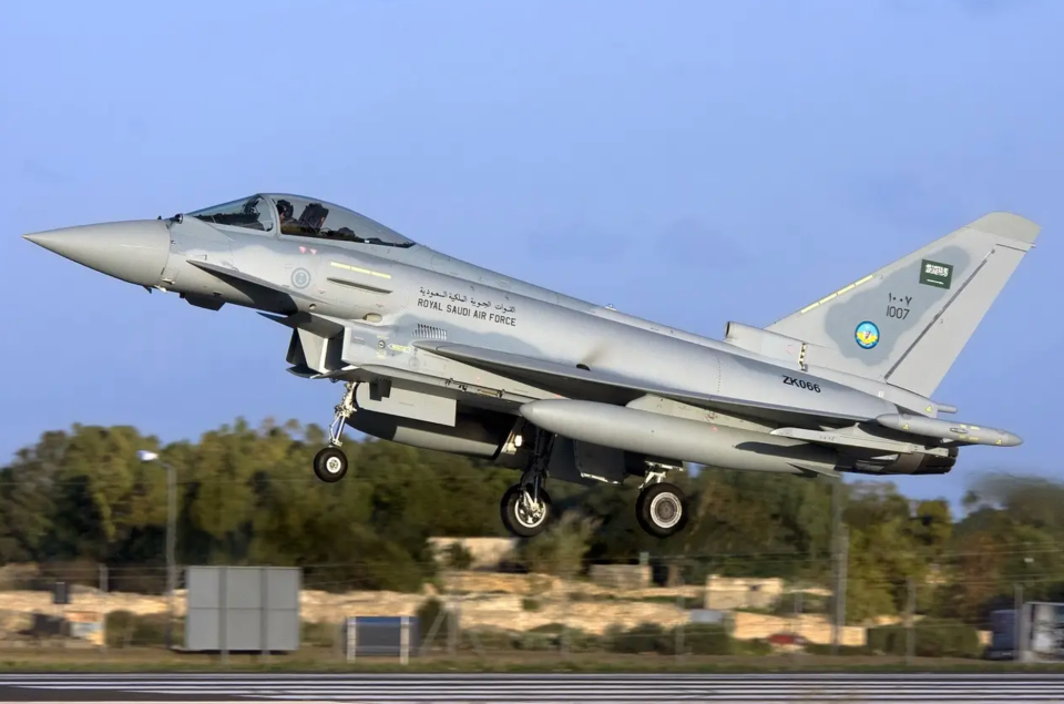 A Royal Saudi Air Force Eurofighter Typhoon passes through Luqa, Malta, during its delivery flight from the United Kingdom in December 2009. <em>Gordon Zammit/Wikimedia Commons</em>