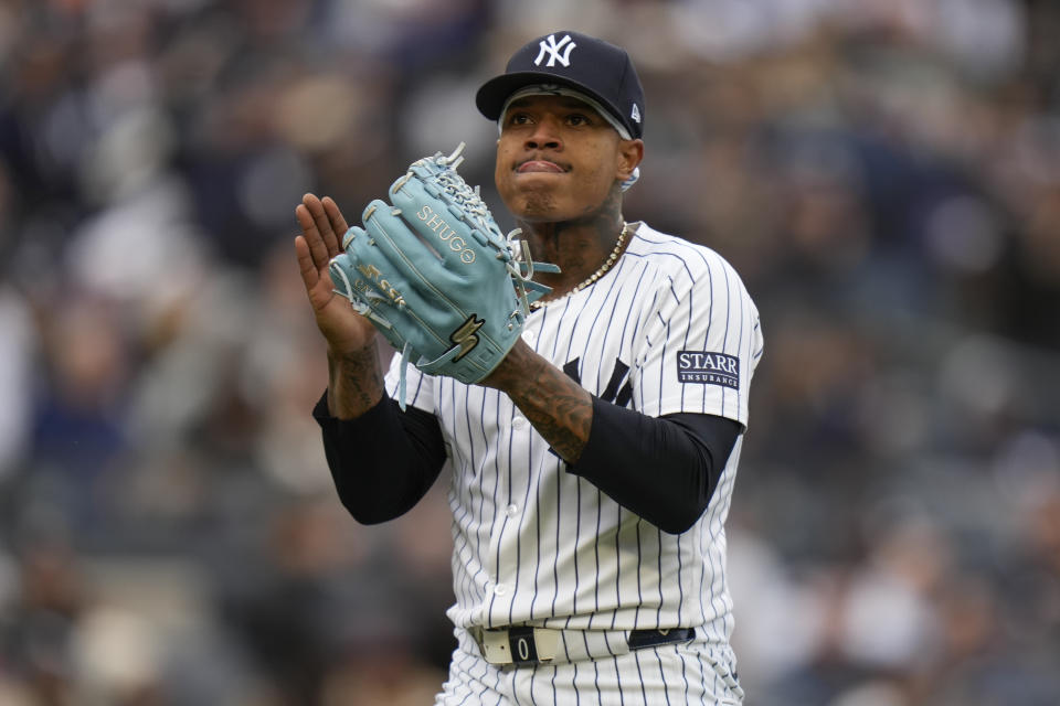 New York Yankees pitcher Marcus Stroman reacts after an out during the sixth inning of a baseball game against the Toronto Blue Jays at Yankee Stadium in New York, Friday, April 5, 2024. (AP Photo/Seth Wenig)