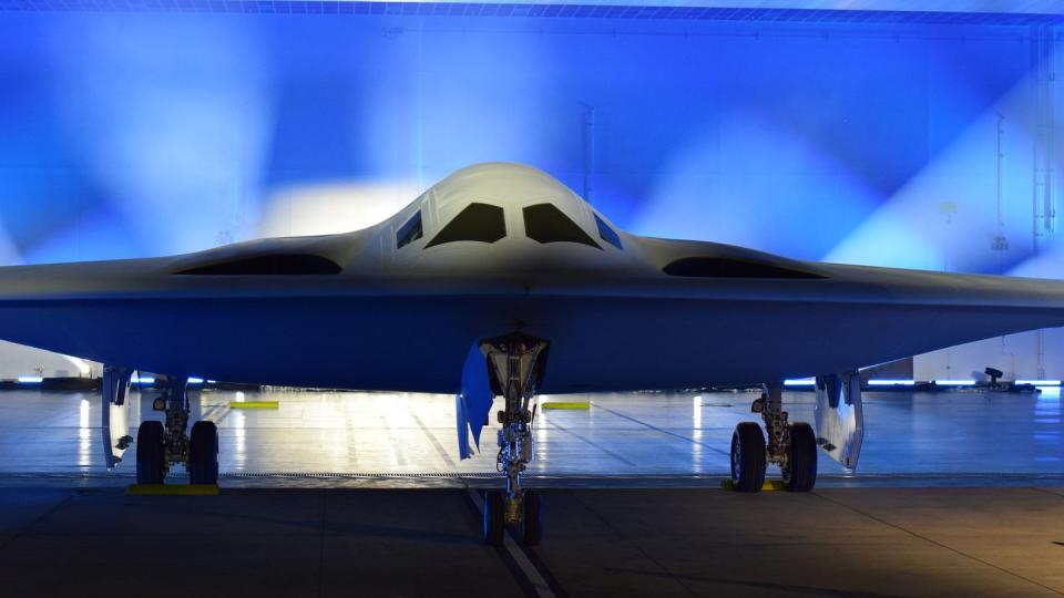 The first B-21 Raider rolls out of a hangar at Air Force Plant 42 in Palmdale, California, on Dec. 2, 2022. (Stephen Losey/Defense News)