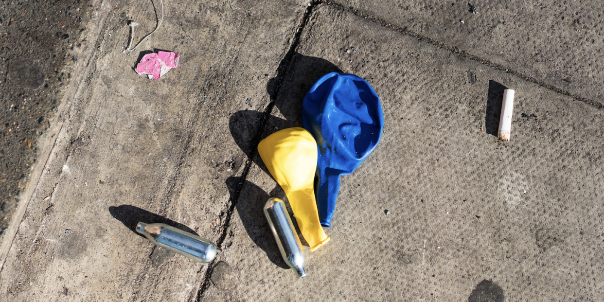 canisters and discarded balloons