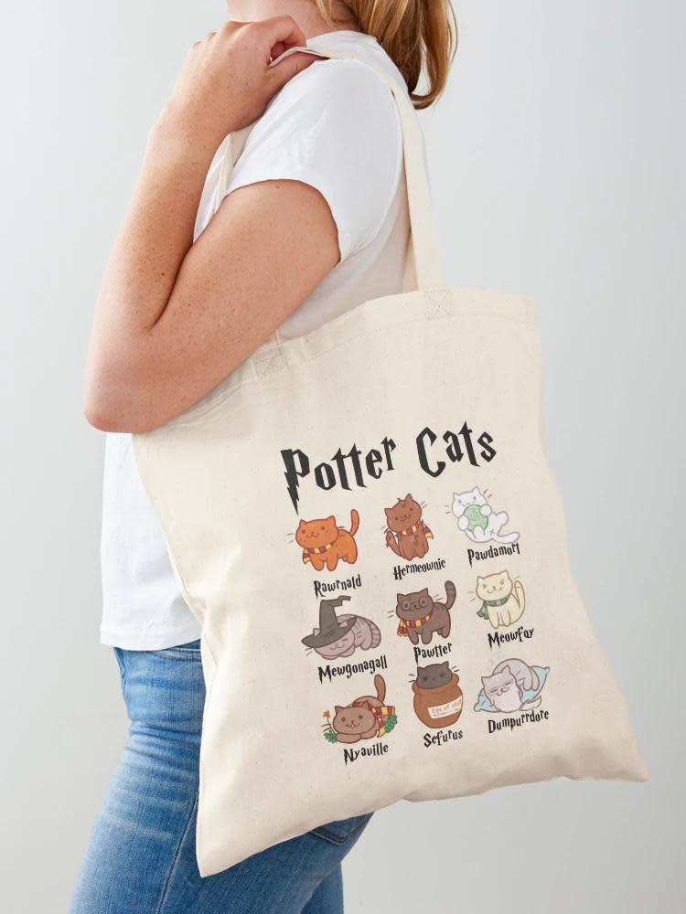 <p><a href="https://go.redirectingat.com?id=74968X1596630&url=https%3A%2F%2Fwww.redbubble.com%2Fi%2Ftote-bag%2FPotterr-Cats-by-Slythh%2F143825634.P1QBH&sref=https%3A%2F%2Fwww.womansday.com%2Frelationships%2Ffamily-friends%2Fg29480271%2Fgifts-for-cat-lovers%2F" rel="nofollow noopener" target="_blank" data-ylk="slk:Shop Now;elm:context_link;itc:0;sec:content-canvas" class="link ">Shop Now</a></p><p>Potter Cats Tote Bag</p><p>redbubble.com</p><p>$15.35</p>
