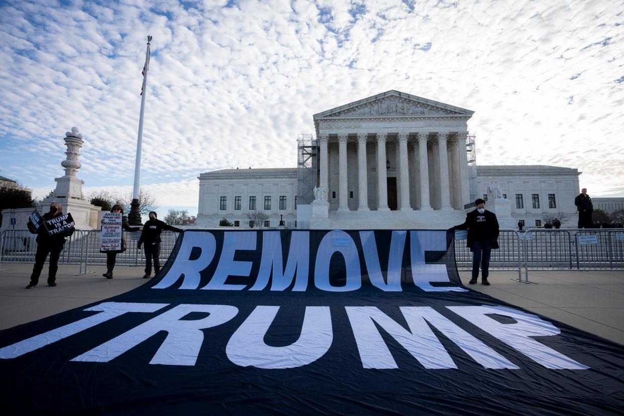 Protestors gather outside the United States Supreme Court on Feb. 8, 2024 as the court reviews a ruling by a Colorado court that barred former President Donald Trump from appearing on the state’s Republican primary ballot due to his role in the Jan. 6, 2021 attacks on the U.S. Capitol.