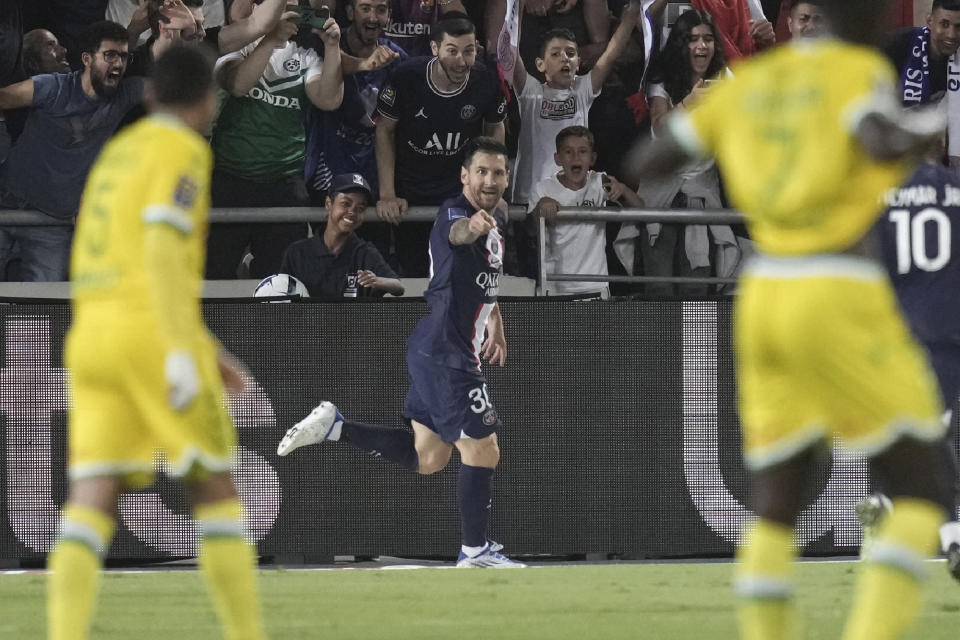PSG's Lionel Messi celebrates after scoring his side's opening goal during the French Super Cup final soccer match between Nantes and Paris Saint-Germain at Bloomfield Stadium in Tel Aviv, Israel, Sunday, July 31, 2022. (AP Photo/Ariel Schalit)
