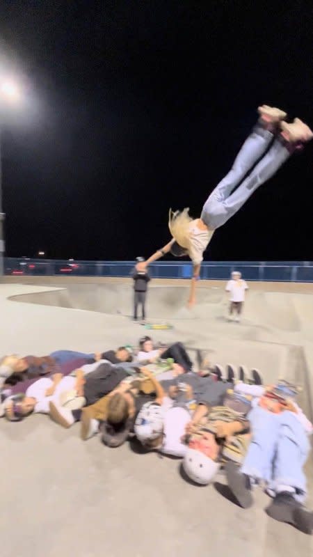 Mia Peterson broke a Guinness World Record when she roller skated off a quarter pipe and performed a barani flip over 12 people. Photo courtesy of Guinness World Records