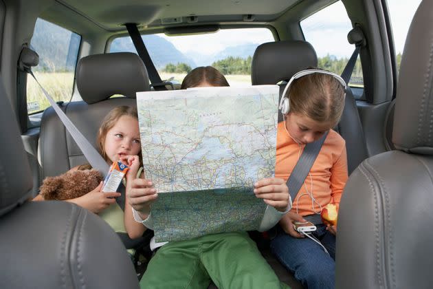 In the past, you wouldn't dream of taking a trip without a AAA map or Rand McNally road atlas in the car. (If your cell service stinks, it's still a good idea to buy one.) (Photo: Noel Hendrickson via Getty Images)