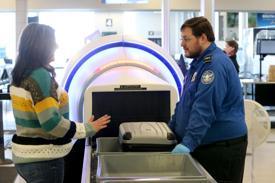 A TSA agent works at his post Friday, Jan. 27, 2023, at the airport in South Bend.