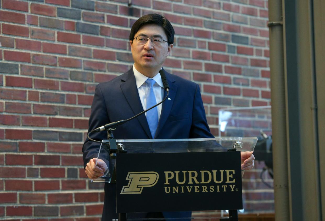 Mung Chiang, president of Purdue University, speaks to an audience about Purdue University's new partnership with Ericsson and Saab to bring a private 5G network to Purdue's airport, on Monday, March 20, 2023, in West Lafayette, Ind.