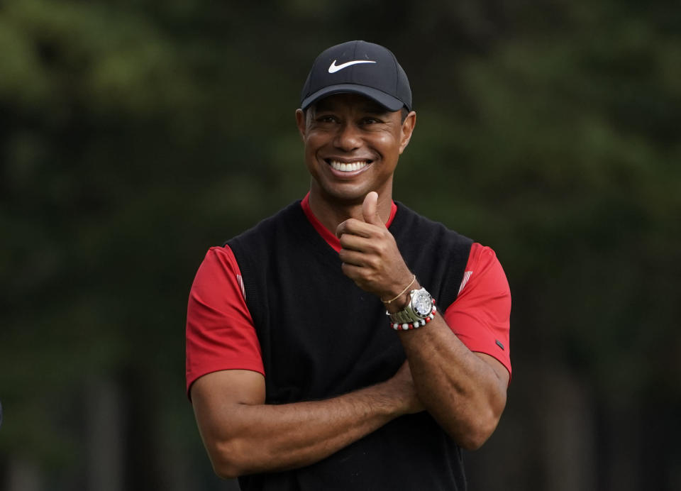 Tiger Woods of the United States gestures during a winner's ceremony after winning the Zozo Championship PGA Tour at the Accordia Golf Narashino country club in Inzai, east of Tokyo, Japan, Monday, Oct. 28, 2019. (AP Photo/Lee Jin-man)