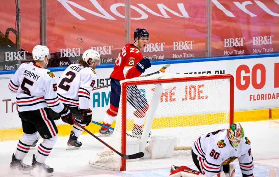 Florida Panthers center Eetu Luostarinen (27) reacts after scoring a goal against Chicago Blackhawks goalie Collin Delia (60) during the third period of the Florida Panthers NHL home opener game at the BB&T Center on Sunday, January 17, 2021 in Sunrise, Fl.