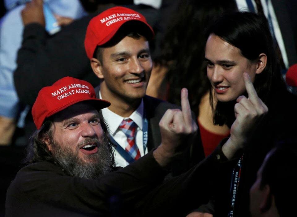 Far-right extremist Pax Dickinson celebrates Donald Trump&rsquo;s election in 2016 with Hoan Ton-That in New York City. (Photo: REUTERS/Mike Segar)