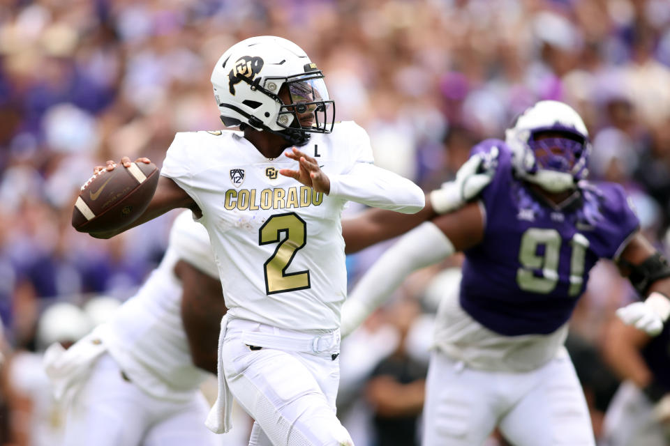 Sep 2, 2023; Fort Worth, Texas, USA; Colorado Buffaloes quarterback <a class="link " href="https://sports.yahoo.com/ncaaf/players/320640" data-i13n="sec:content-canvas;subsec:anchor_text;elm:context_link" data-ylk="slk:Shedeur Sanders;sec:content-canvas;subsec:anchor_text;elm:context_link;itc:0">Shedeur Sanders</a> (2) throws a pass in the second quarter against the <a class="link " href="https://sports.yahoo.com/ncaaf/teams/tcu/" data-i13n="sec:content-canvas;subsec:anchor_text;elm:context_link" data-ylk="slk:TCU Horned Frogs;sec:content-canvas;subsec:anchor_text;elm:context_link;itc:0">TCU Horned Frogs</a> at Amon G. Carter Stadium. Mandatory Credit: Tim Heitman-USA TODAY Sports