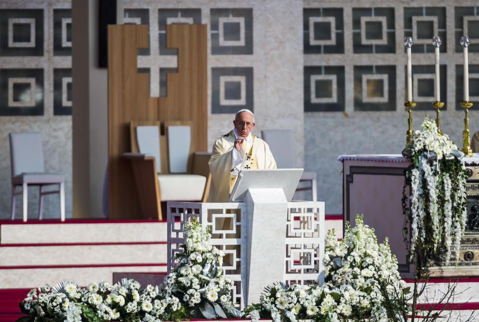 Pope Francis delivers his homily in Monza, 30 kilometers north of Milan, Italy, during a Mass as part of his one-day pastoral visit to Monza and Milan, Italy’s second-largest city, Saturday, March 25, 2017. Pope Francis focused his one-day visit Saturday to the wealthy northern Italian city of Milan on those marginalized by society, visiting families in a housing project and exhorting clergy and nuns gathered in a cathedral to minister to the peripheries. (AP Photo/Giuseppe Aresu)