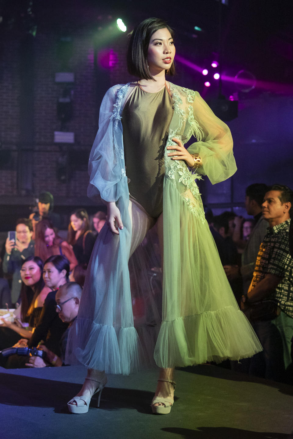 Mia Chow competing in the swimwear segment during the 2019 Miss Universe Singapore at Zouk.