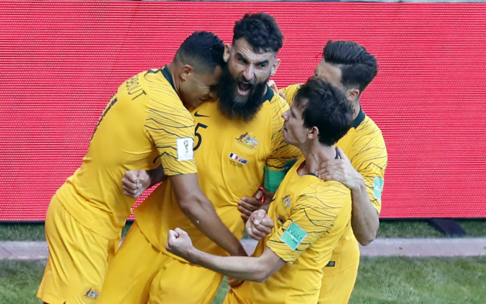 Mile Jedinak celebrates after equalising for Australia in Kazan (AP Photo/Hassan Ammar)