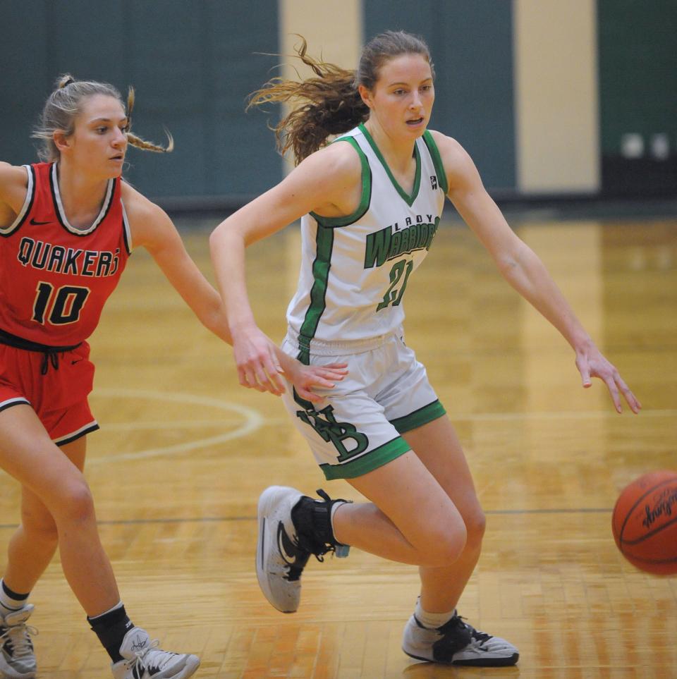 West Branch's Sophia Gregory is guarded by Salem's Rylee Hutton in an Eastern Buckeye Conference game at the West Branch Field House Wednesday, February 1, 2023.