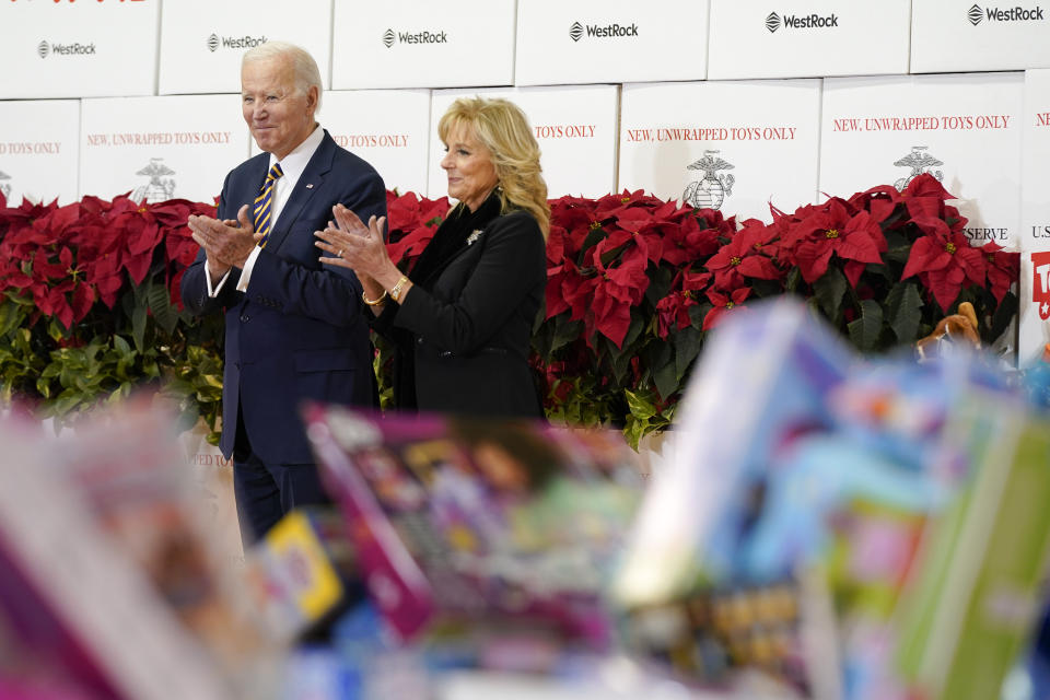 President Joe Biden and first lady Jill Biden participate in a Toys for Tots sorting event at Joint Base Myer-Henderson Hall in Arlington, Va., Monday, Dec. 12, 2022. (AP Photo/Patrick Semansky)