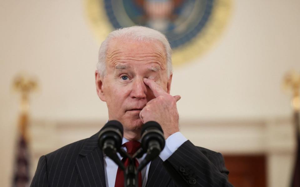 Mr Biden said the toll was "heartbreaking" - REUTERS