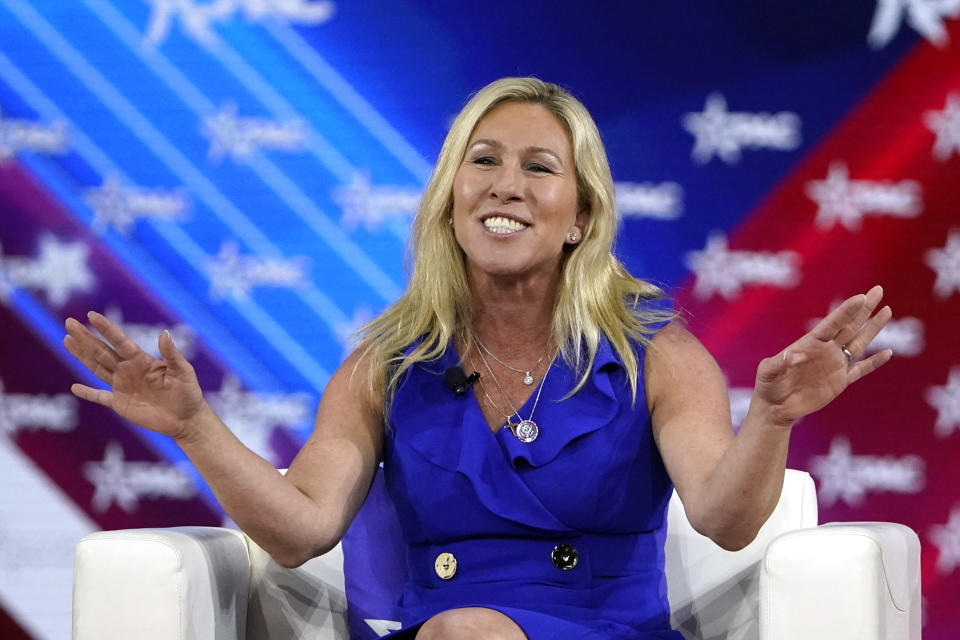 Rep. Marjorie Taylor Greene, R-Ga., answers questions during a panel discussion at the Conservative Political Action Conference (CPAC) Saturday, Feb. 26, 2022, in Orlando, Fla. (AP Photo/John Raoux)