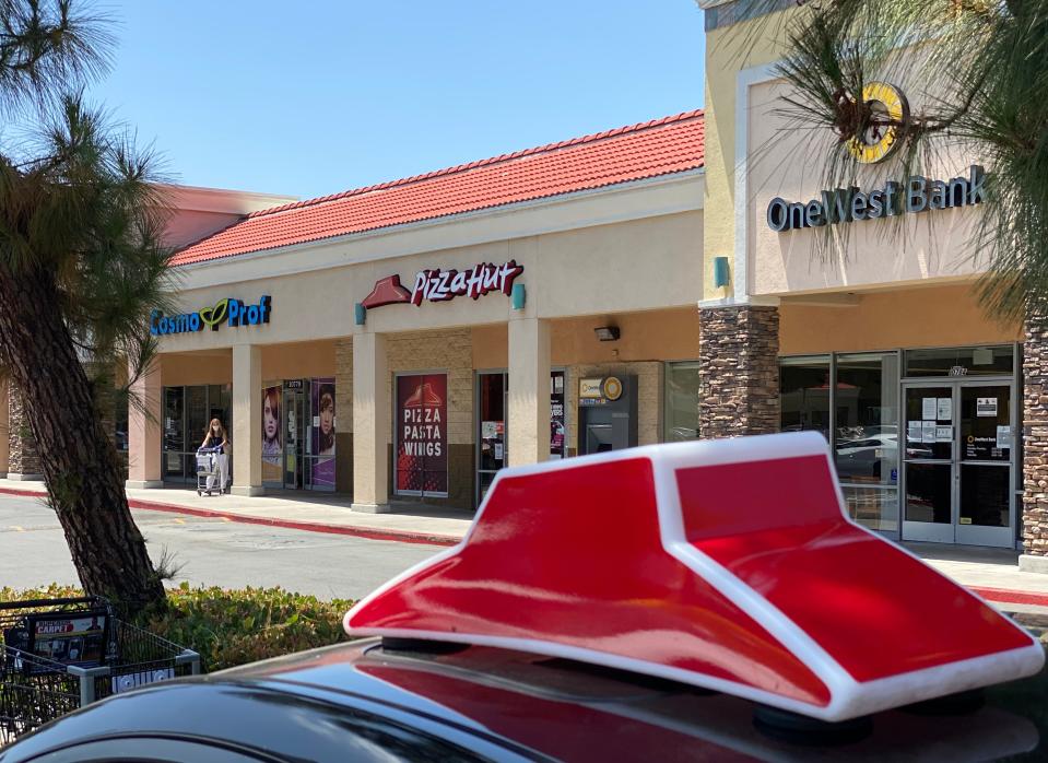 Pizza Hut is laying off more than 1,000 delivery drivers in California, according to federal and state filings. Fast-food workers in the state are set to get a pay bump in April 2023 as the minimum wages rises from $16 to $20 an hour.