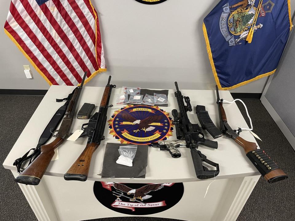 Authorities seized these guns and drugs from a Sanford woman, who is now facing trafficking charges, on May 24, 2023.