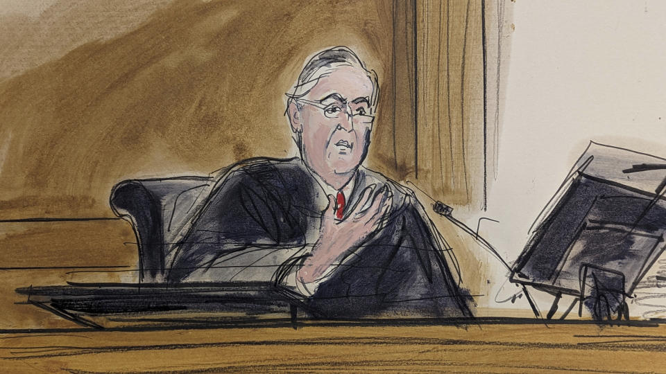 In this courtroom sketch, in federal court in New York, Thursday, Feb. 16, 2023, Judge Lewis Kaplan speaks from bench during the hearing of Samuel Bankman-Fried. Kaplan showed growing impatience Thursday with FTX founder Sam Bankman-Fried's use of the internet, suggesting that incarceration might eventually be the most effective way to prevent him from violating his bail conditions by communicating on electronic devices in ways that can't be traced. (AP Photo/Elizabeth Williams)