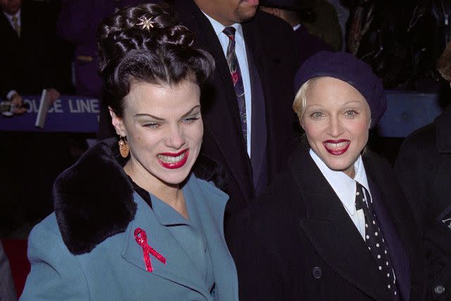 <p>HELAYNE SEIDMAN/AFP via Getty Images</p> Debi Mazar and Madonna in November 1992