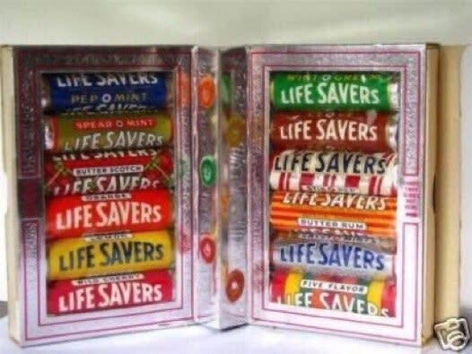 Rolls of Life Savers in a "book"