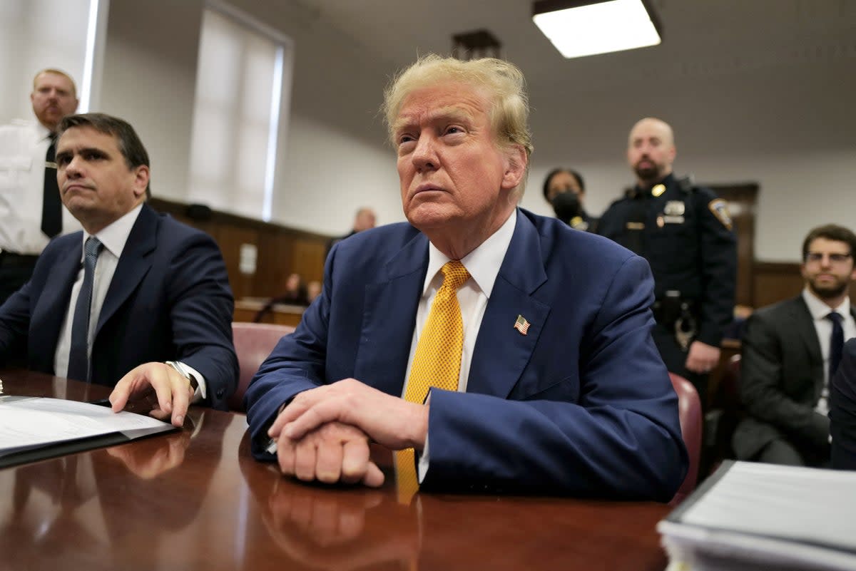 Donald Trump sits in a criminal courtroom in Manhattan on 2 May (via REUTERS)