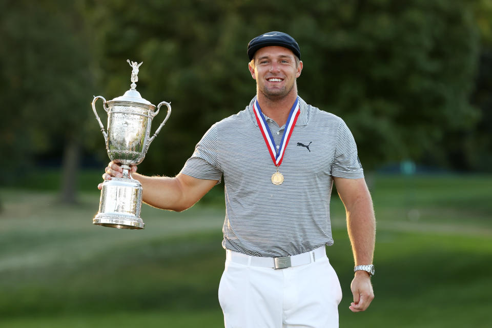 MAMARONECK, NEW YORK - SEPTEMBER 20: Bryson DeChambeau of the United States celebrates with the championship trophy after winning the 120th U.S. Open Championship on September 20, 2020 at Winged Foot Golf Club in Mamaroneck, New York. (Photo by Gregory Shamus/Getty Images)