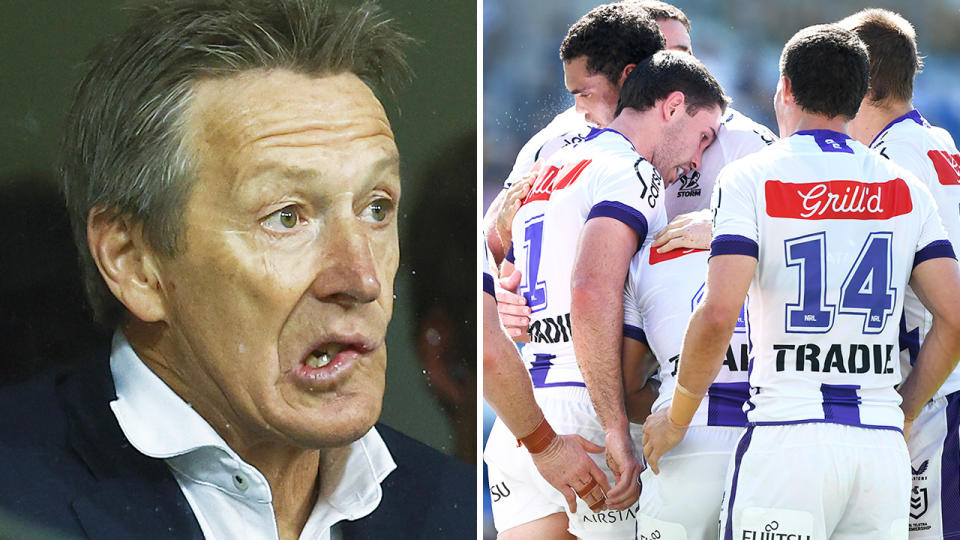 Melbourne Storm coach Craig Bellamy is pictured left, with Melbourne Storm players huddled on the right.