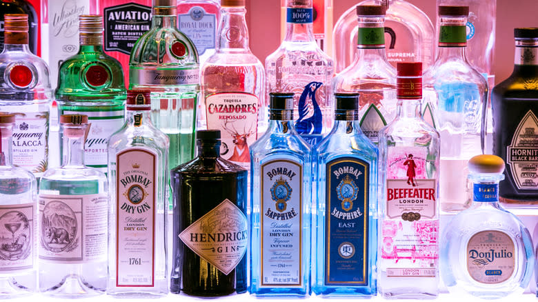 bottles of gin on bar shelf