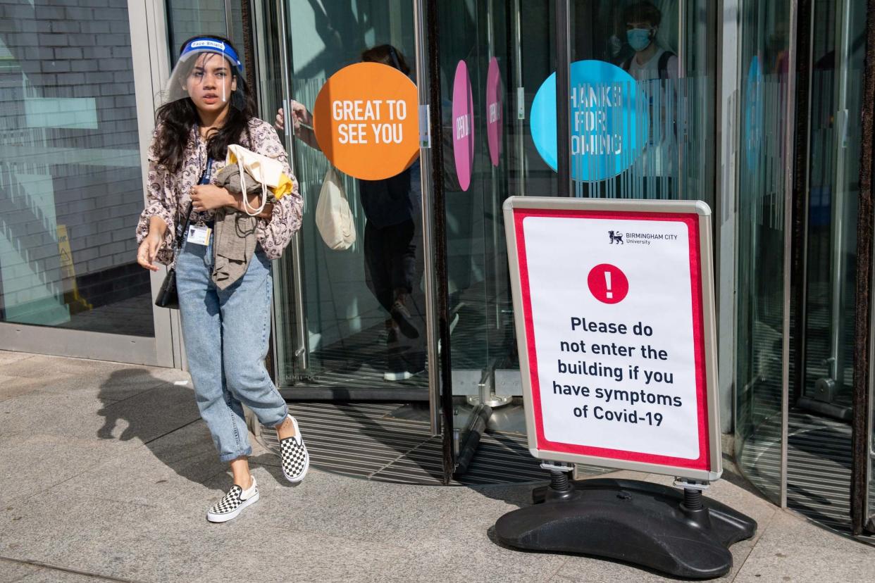 Students at Birmingham City University arrive for the start of term: PA