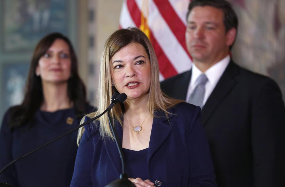 Then-Florida Supreme Court Justice Barbara Lagoa pictured along with by Florida Gov. Ron DeSantis, a Trump ally.