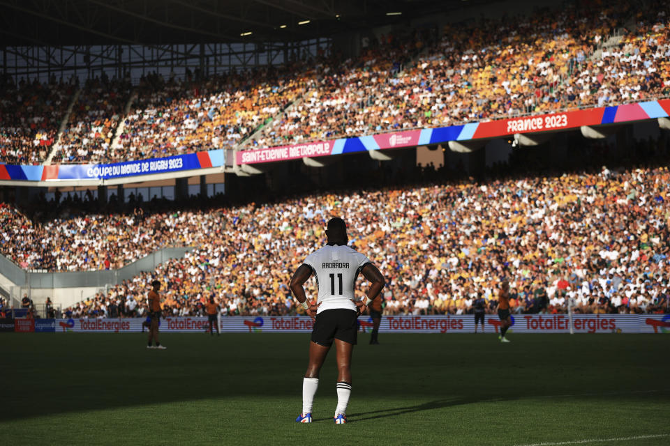 Fiji's Semi Radradra stands on the pitch during the Rugby World Cup Pool C match between Australia and Fiji at the Stade Geoffroy Guichard in Saint-Etienne, France, Sunday, Sept. 17, 2023. (AP Photo/Aurelien Morissard)