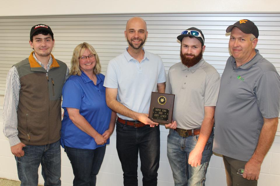 Cody Lynch (second from right) of Baer Brothers Maple near Somerset accepts the Pa. Maple King award given by the Somerset Rotary Club, represented here by Lee Hoffman (center) during the Somerset County Maple Producers banquet held at Somerset Masonic Temple on Saturday, June 24. Lynch received this year's Pa. Maple King during a contest at the Pa. Maple Festival on April 21. His parents, Mike and Sherry Lynch, and brother Reagan Lynch are also pictured. Photo by Sandra Lepley