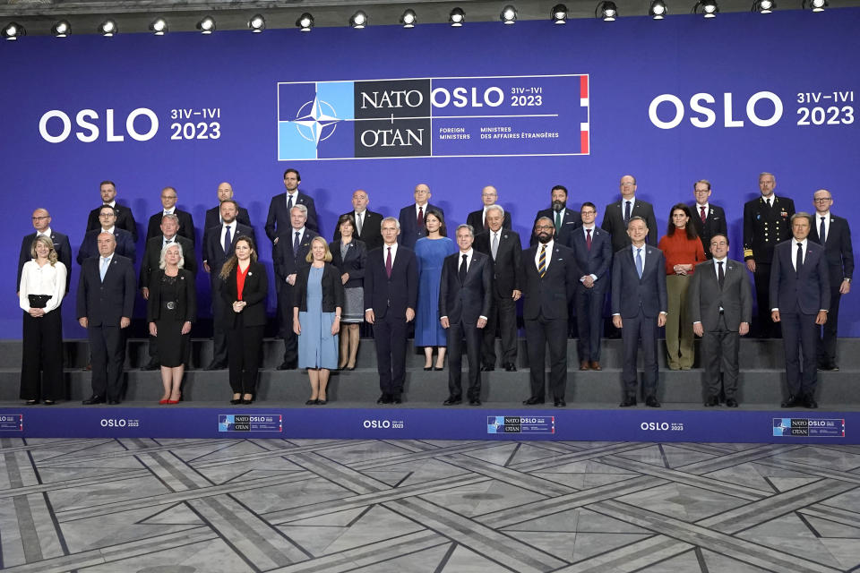 Foreign Ministers, including U.S. Secretary of State Antony Blinken, front row fifth from right, and other officials, including NATO Secretary-General Jens Stoltenberg, front row center, pose for a family photo during a meeting of NATO foreign ministers in Oslo, Norway, Thursday, June 1, 2023. (Lise Aserud/Pool Photo via AP)