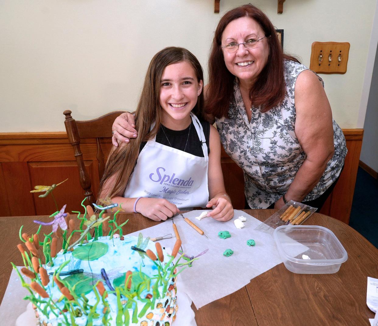 Elena Scray, left, and her grandmother Lois Trongard, of Pewaukee, both love entering baking competitions at Wisconsin State Fair. Scray has won many ribbons for her entries.