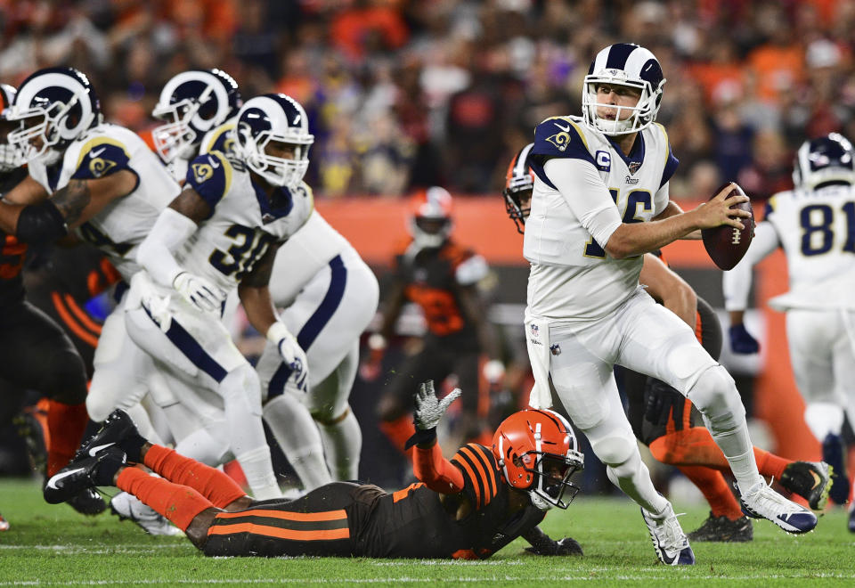 Los Angeles Rams quarterback Jared Goff (16) scrambles during the first half of an NFL football game against the Cleveland Browns, Sunday, Sept. 22, 2019, in Cleveland. (AP Photo/David Dermer)