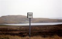 A road sign is seen on the small island of Bressay situated off the east coast of mainland Shetland April 4, 2014. REUTERS/Cathal McNaughton