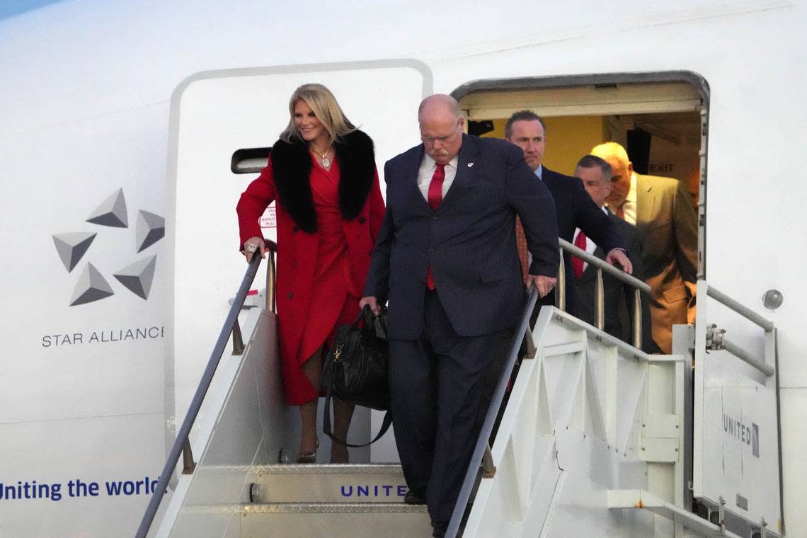 Feb 4, 2024; Las Vegas, NV, USA; Kansas City Chiefs coach Andy Reid and wife Tammy Reid exit plane during Super Bowl 58 team arrivals at the Harry Reid International Airport.
