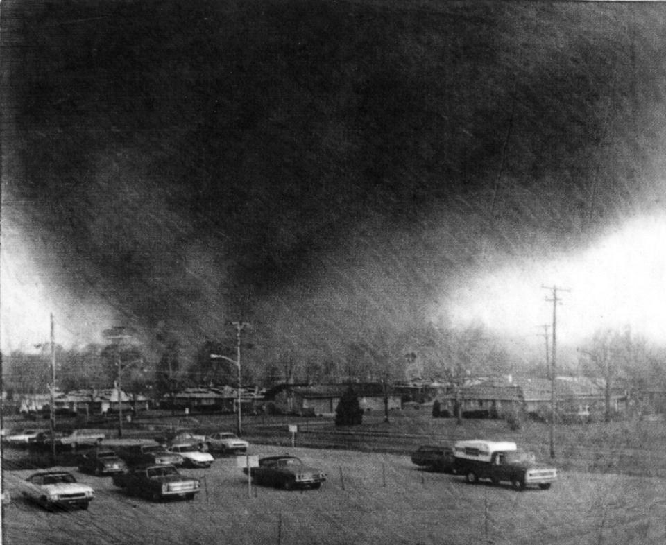 A tornado funnel is shown moving through Xenia in 1974.
