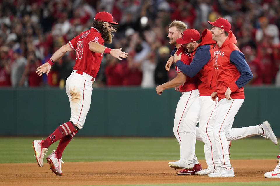 Los Angeles Angels starting pitcher Reid Detmers (48) celebrates with teammates after throwing a no hitter against the Tampa Bay Rays in a baseball game in Anaheim, Calif., Tuesday, May 10, 2022. The Angels won 12-0. (AP Photo/Ashley Landis)