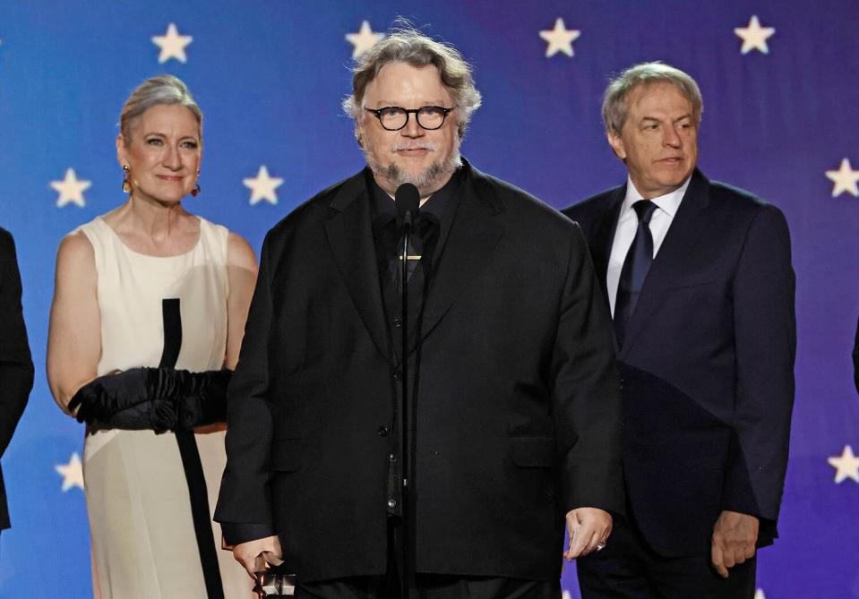 LOS ANGELES, CALIFORNIA - JANUARY 15: (L-R) Lisa Henson, Guillermo del Toro, and Gary Ungar, accept the Best Animated Feature award for "Guillermo del Toro's Pinocchio" onstage during the 28th Annual Critics Choice Awards at Fairmont Century Plaza on January 15, 2023 in Los Angeles, California. (Photo by Kevin Winter/Getty Images for Critics Choice Association)