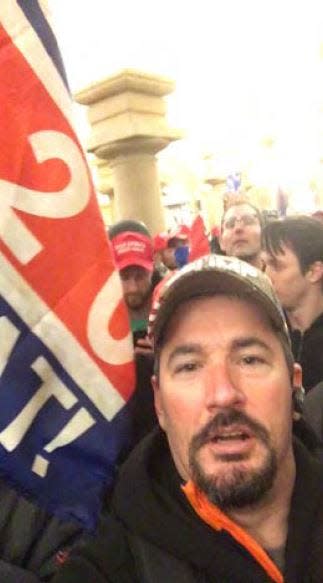 A photo of Kentucky resident Robert L. Bauer inside the U.S. Capitol building Jan. 6. He's been charged federally with trespassing.