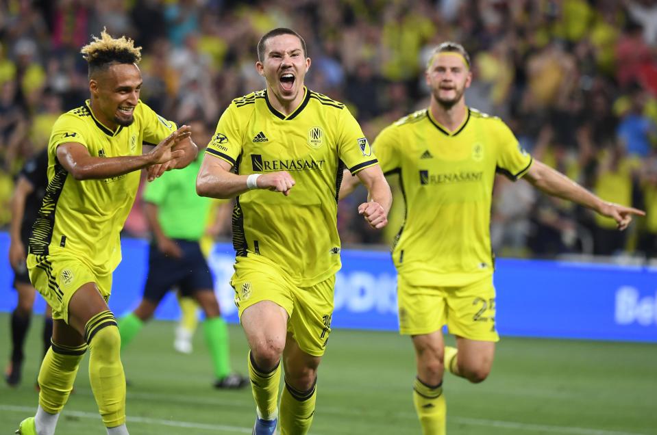 May 18, 2022; Nashville, Tennessee, USA; Nashville SC midfielder Alex Muyl (19) celebrates after a goal during the first half against the CF Montreal at GEODIS Park.