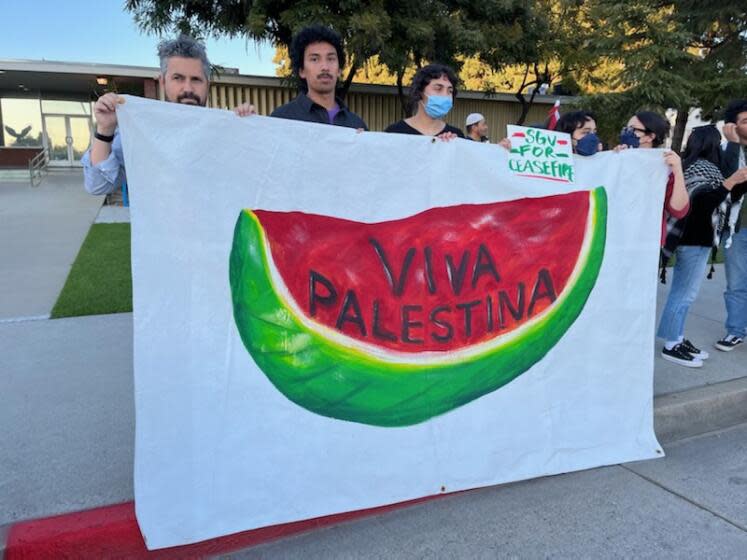 Activists rally outside El Monte City Hall on Tuesday, April 2 before the El Monte city Council meeting. The council unanimously passed a resolution asking for a permanent cease-fire in Gaza, becoming the seventh Latino majority city in Southern California to do so.