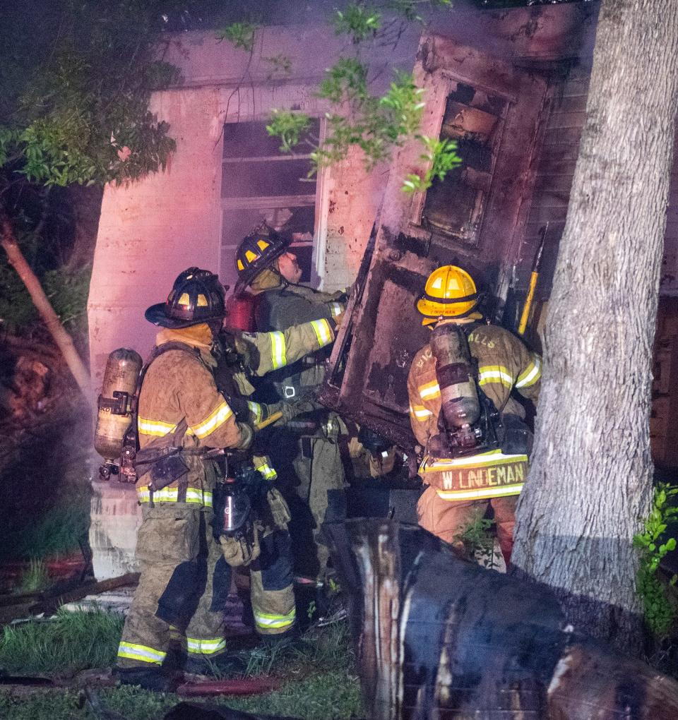 Wichita Falls firefighters worked to control a fire in a mobile home community on 9th Street Tuesday morning.