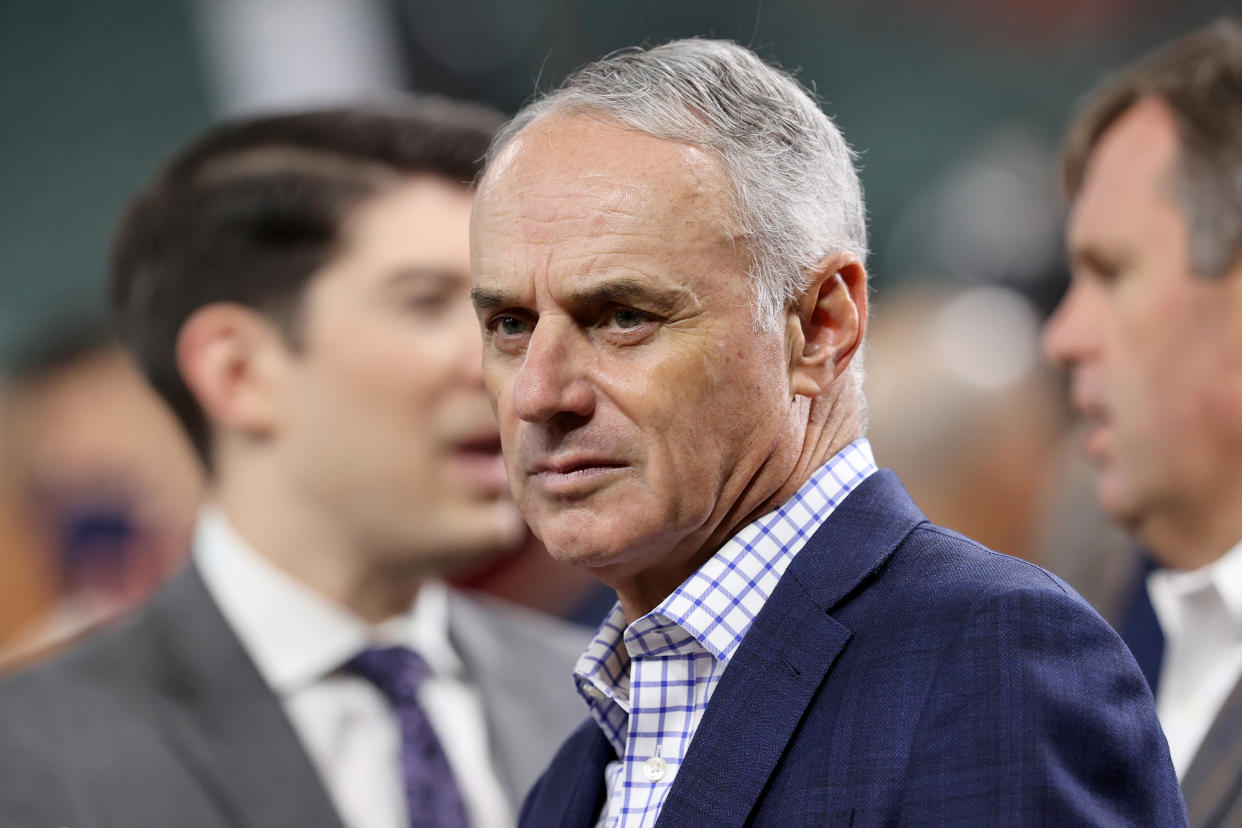Commissioner Rob Manfred, seen here at the 2021 World Series, leads a group of team owners who initiated the lockout.  (Photo by Bob Levey/Getty Images)