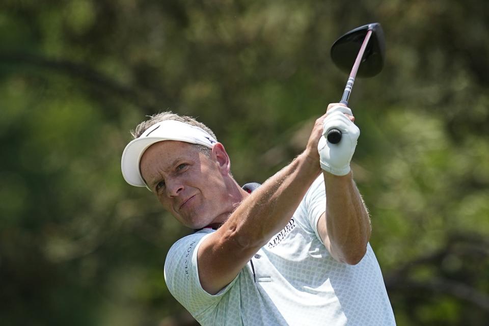 FILE - Luke Donald, of England, watches his tee shot on the second hole during the third round of the Memorial golf tournament, Saturday, June 3, 2023, in Dublin, Ohio. It’s four down and eight to go in Europe’s Ryder Cup team. The race for a spot in Luke Donald’s 12-man lineup for next month’s Ryder Cup in Italy is in the home stretch. The final two automatic places will be determined at the European Masters starting Thursday, Aug. 31, 2023, in the picturesque surroundings of Crans-sur-Sierre. (AP Photo/Darron Cummings, File)
